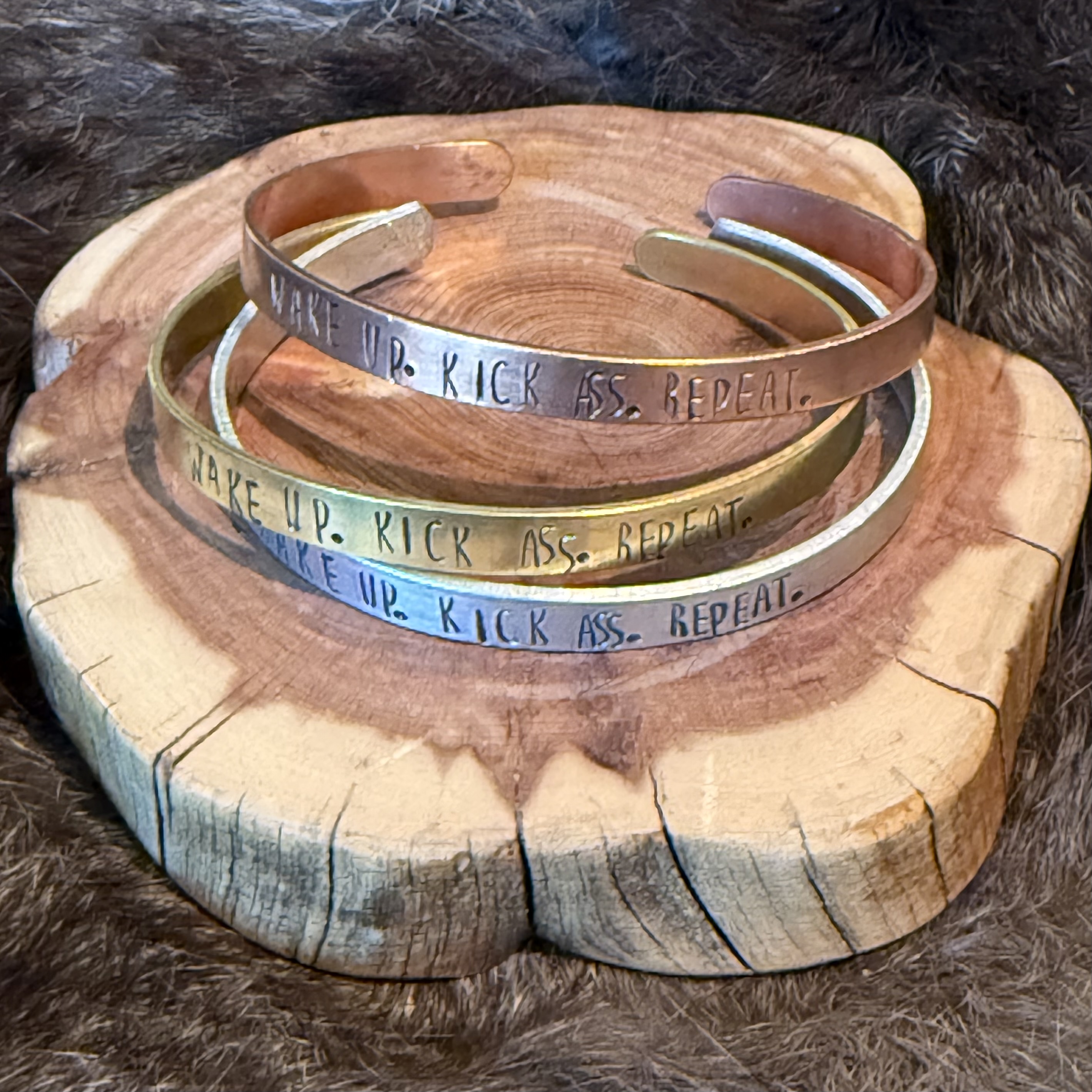 Wake Up. Kick Ass. Repeat. Cuff